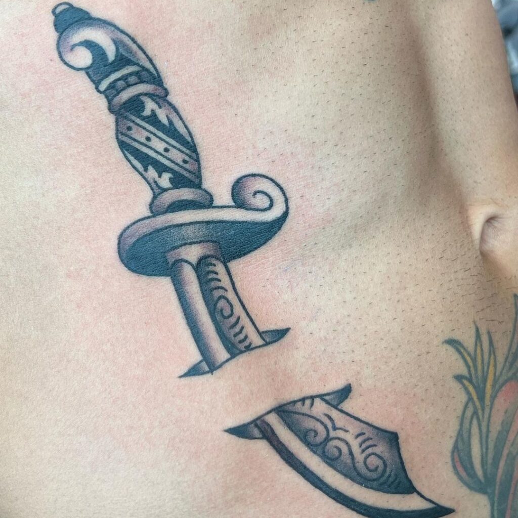 American traditional dagger tattoo
