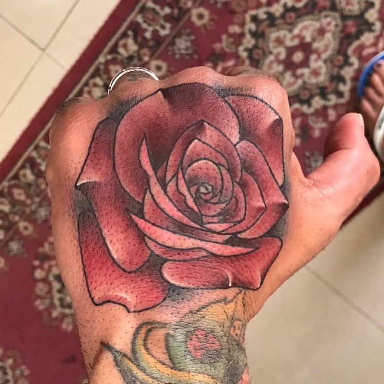 American traditional rose hand tattoo